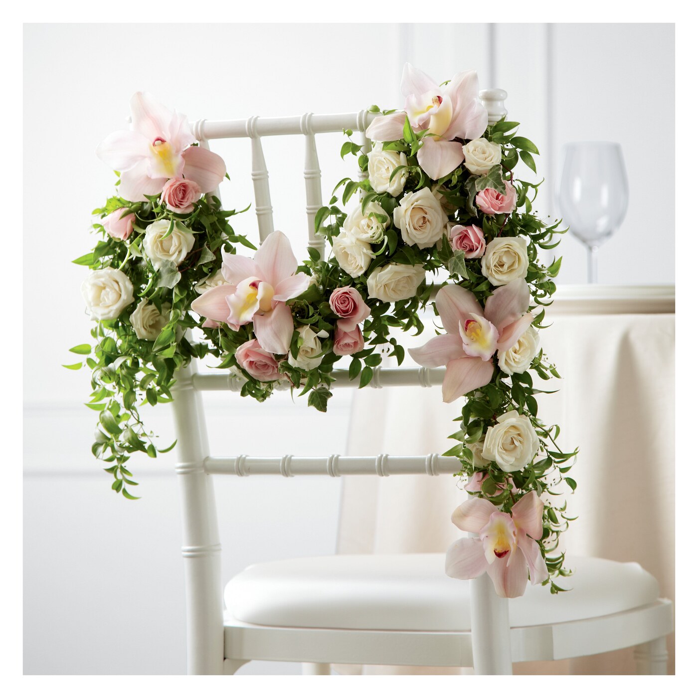 Orchid Rose Chair Décor flower arrangement